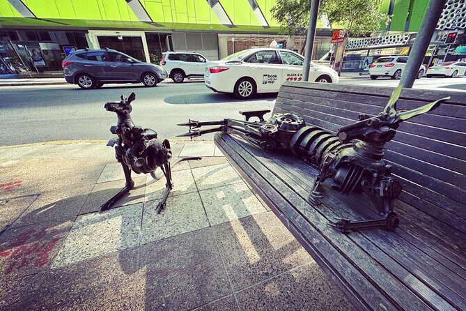 Brisbane City Walking Tour: local guide, small group, 100 mins - King George Square and City Hall: statues with stories, plus renovation clues